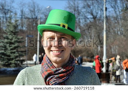 MOSCOW - MAR 14: Smiling guy with green hat during St Patrick\'s day party in Moscow on March 14. 2015 in Russia