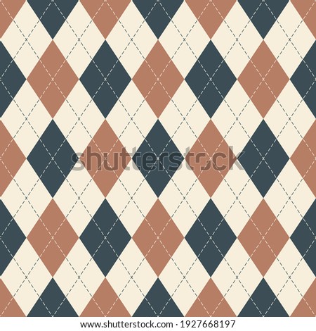 Argyle pattern seamless background in grey, brown, off white. Geometric stitched argyll vector graphic art for gift wrapping paper, socks, sweater, jumper, other modern autumn textile or paper design.
