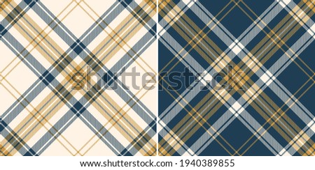 Tartan check texture pattern set in blue, gold, off white. Seamless striped graphic background vector plaid for autumn winter flannel shirt, duvet cover, scarf, other everyday fashion fabric design. Foto d'archivio © 