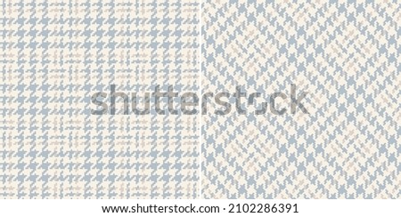 Abstract plaid pattern tweed in pale blue and beige for spring autumn winter. Seamless soft cashmere tartan vector illustration set for jacket, skirt, coat, trousers, blanket, other fabric design.
