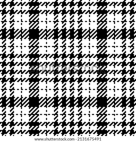 Abstract check plaid pattern tweed in black and white. Seamless classic elegant neutral tartan vector for spring summer autumn winter scarf, dress, jacket, skirt, other modern fashion textile print.
