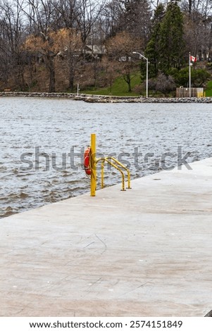 Similar – Foto Bild Rettungsring auf Steg an Anlegestelle