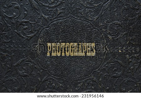 Nineteen-forties era leather photograph album cover detail. Leather shows lots of wear.