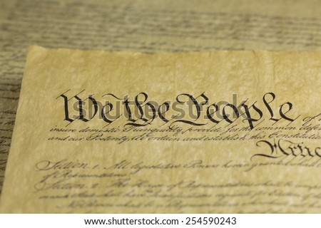 We the People are the opening words of the preamble to the Constitution of the United States of America. Shallow depth of field.