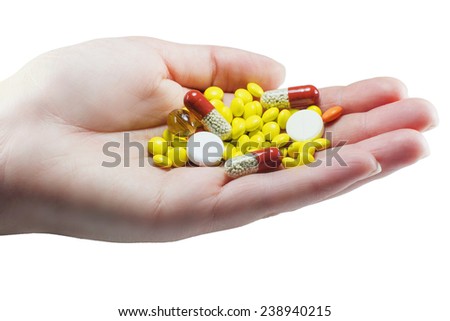 female palm colored and white pills isolate