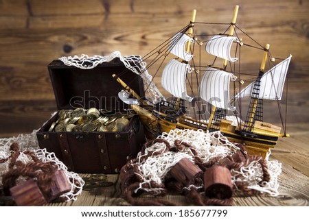 pirate ship, chest of gold, rope, compas