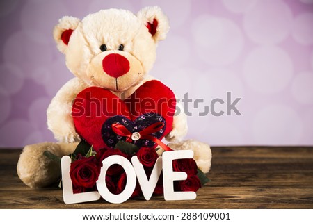 Day of love, Valentine's Day, roses and a teddy bear.