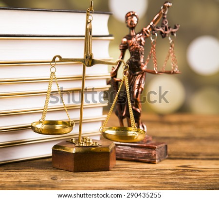 Golden scales of justice, books, Statue of Lady Justice.