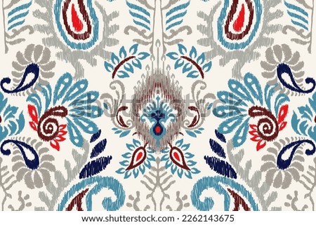 Ikat floral paisley embroidery on white background.geometric ethnic oriental seamless pattern traditional.Aztec style abstract vector illustration.design for texture,fabric,clothing,wrapping,scarf.