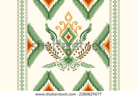 Ikat floral paisley embroidery on white background.Ikat ethnic oriental pattern traditional.Aztec style abstract vector illustration.design for texture,fabric,clothing,wrapping,decoration,scarf,carpet