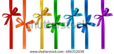 Set of colored bow with vertical ribbon. Vector bow isolated on white