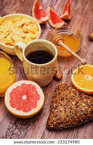 tasty breakfast with juice, corn flakes and pie