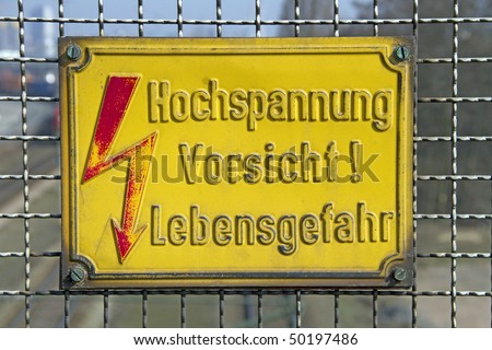 warning sign high voltage in german language