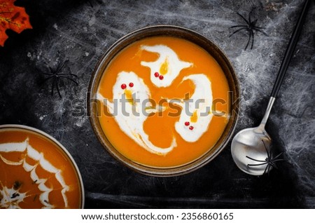 Image, Stock Photo Tasty pumpkin soup in bowl on table