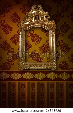 antique carved frame on the wall in the interior