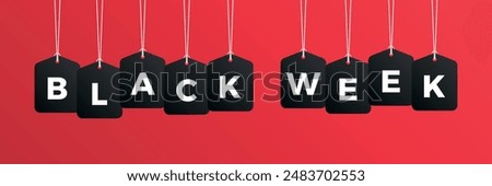 Black week sale price tag hanging on background