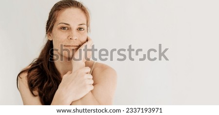 Similar – Image, Stock Photo Confident pensive freckled woman smoking on bed