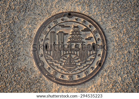 Osaka, Japan - May 5, 2015: Manhole cover at Osaka Castle, Japan
