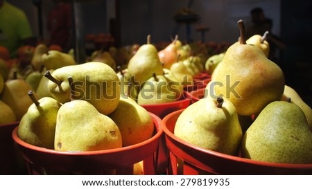 Baskets of Pears Sitting in Jean-Talon Open Market in Montreal, Canada