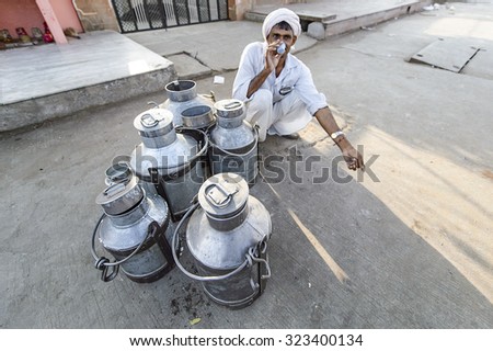 Jaipur, India-September 09, 2015:Daily traditional milk market at the street of Jaipur, India. Cow milk is drinks a day in India.