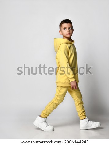 Similar – Image, Stock Photo child with a hood over his eyes