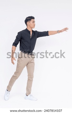 Image, Stock Photo Man reaches into a laundry basket