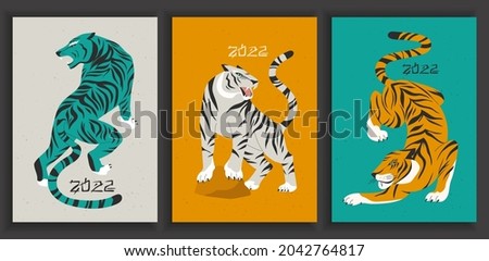 Set of colourful tigers in abstract style. Modern greeting card poster. Hunting tigers in asian style. Chineese 2022 year sign. Year of the Tiger 2022 Japanese new year card.  Photo stock © 