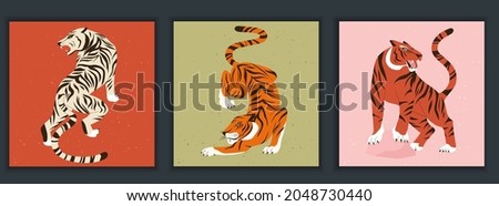 Set of colorful tigers in abstract style. Modern greeting card or poster. Hunting tigers in Asian style. Chinese 2022 year sign. Year of the Tiger 2022 Japanese new year card.