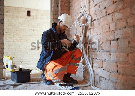 Similar – Image, Stock Photo Male worker using electric grinder in workshop