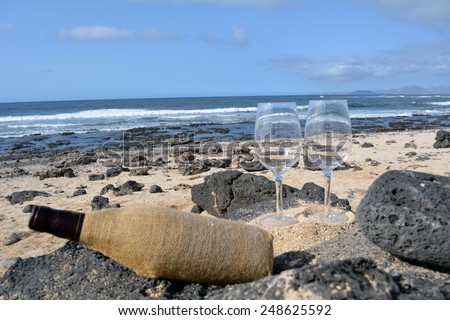 Two glasses of wine in the beach Majanicho in Fuerteventura Canary Island Spain