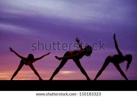 A woman in three dance positions silhouetted in the sunset.