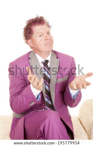 A man in his purple suit sitting on a bench with a questioning expression on his face