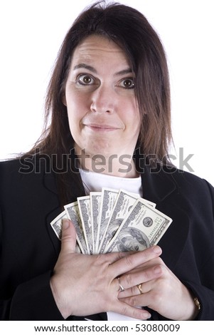 A woman is holding some money up to her and protecting it.