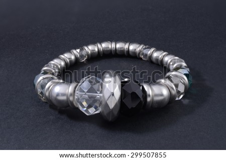 silver bracelet with gems isolated on black