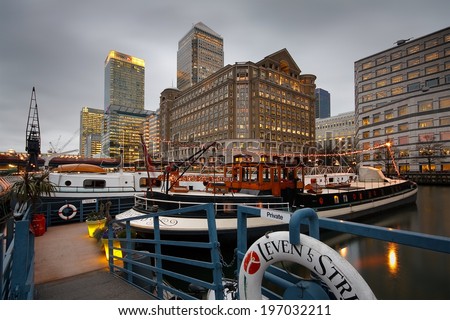 London, UK - January 13 2011: Boats in the North Dock in Canary Wharf, London.