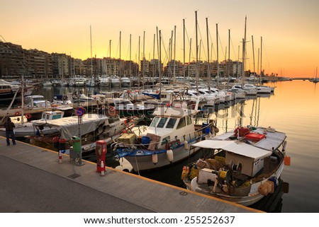 ATHENS, GREECE â?? JANUARY 15 2015: Fishing boats and yachts in Zea Marina in Athens, Greece on January 15th 2015.