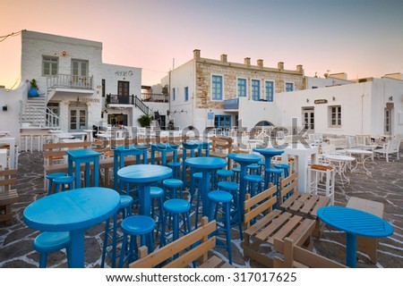 Naousa, Greece - September 05 2015: Coffee shops in the port of Naousa village on Paros island, Greece