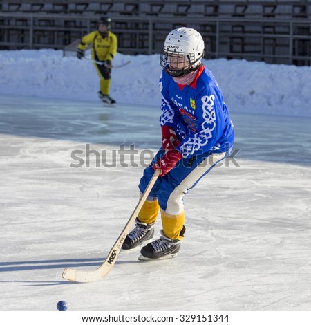 RUSSIA, OBUKHOVO - JANUARY 10, 2015: 2-nd stage children\'s hockey League bandy, Russia.