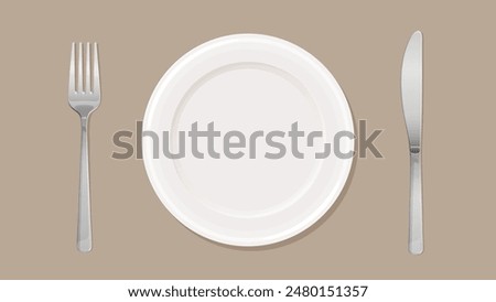 Top view of a plate, fork and knife