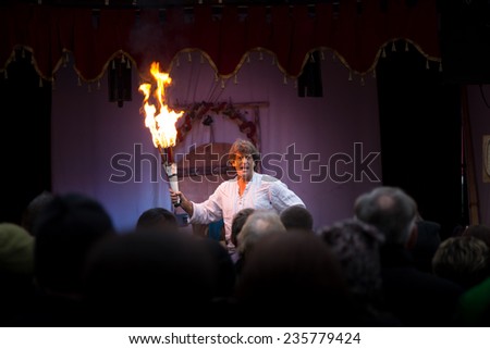 GERMANY, Esslingen am Neckar,  DEC. 06. 2014 :  A Magician of Fire Manipulation, will leave you Breathless as you watch his amazing skills at Christmas Market