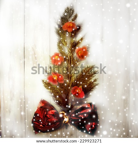 Original Christmas tree, branches and flowers with snowflakes