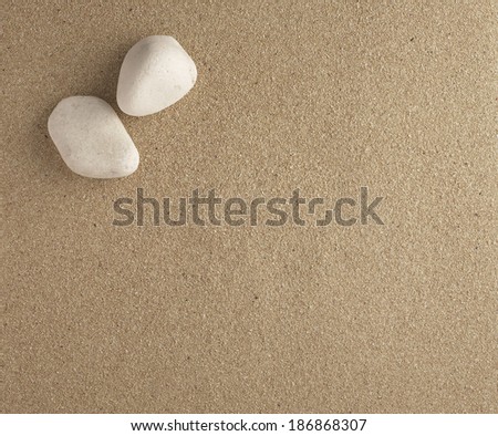 two stones with sand bottom plan view