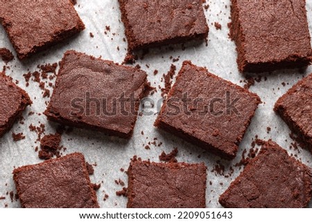 Similar – Image, Stock Photo Brownies cake squares on cooling rack. Chocolate fudge brownies