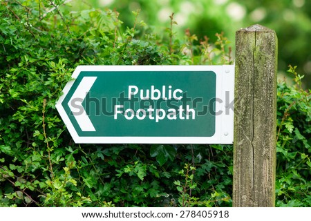 Public foot path sign, with direction arrow.