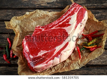 Similar – Foto Bild Kalbfleisch-Rib-Eye mit Gemüse und Soßensoße.