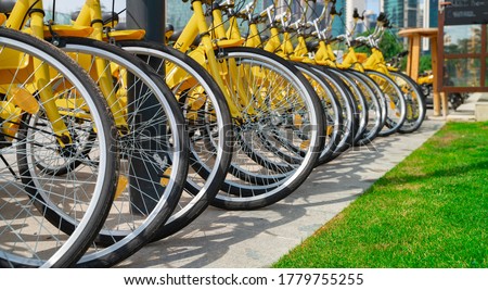 Similar – Image, Stock Photo Bikes in a row at the roadside