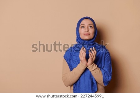 Similar – Image, Stock Photo Graceful Arab woman doing Anjaneyasana pose on pier