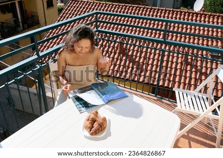 Similar – Image, Stock Photo View of authentic balcony. Carpets hang on balcony in the sun. Facade of residential building, copy space