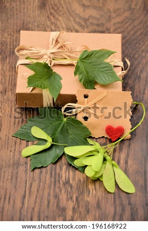 box with a gift with a maple leaf   and heart