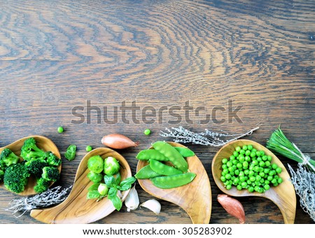 organic vegetables, green peas, broccoli, Brussels sprouts ,with  background for text or logo